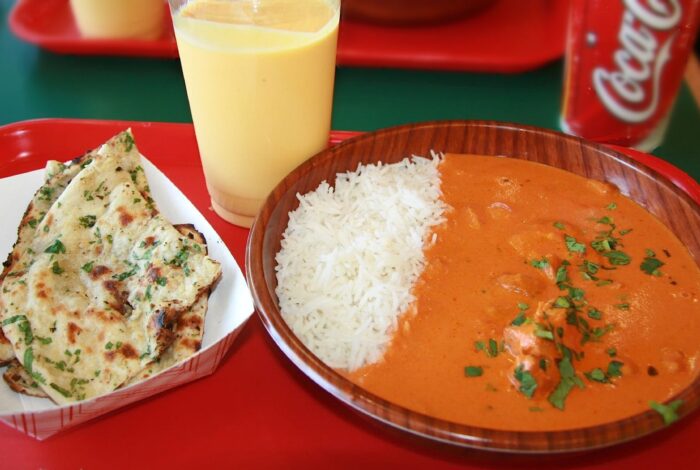 Chicken tikka masala with rice and naan (stock photo, not Curries Indian Cuisine)