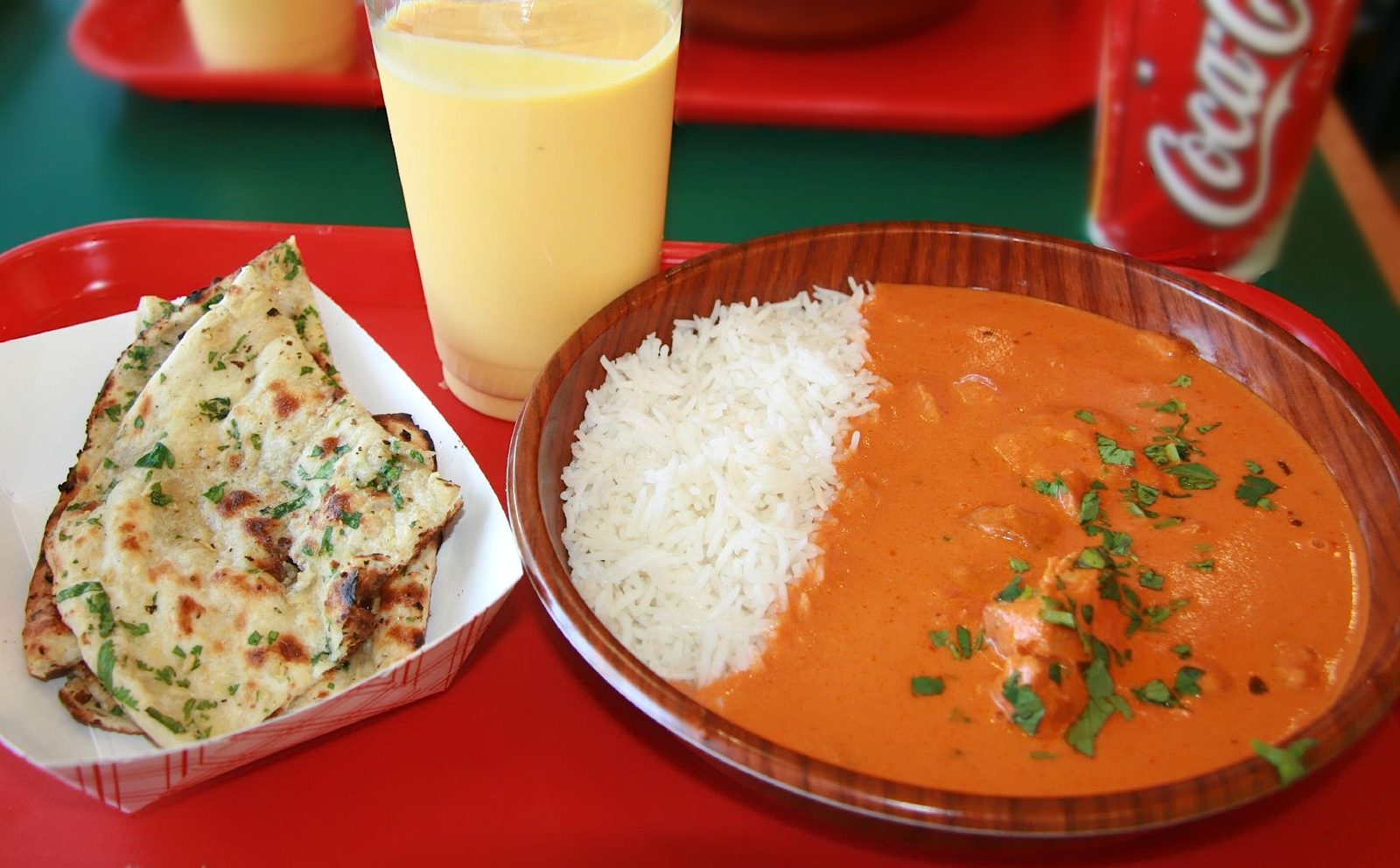 Chicken tikka masala with rice and naan (stock photo, not Curries Indian Cuisine)